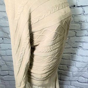 Blattering tan sweater.....🤎